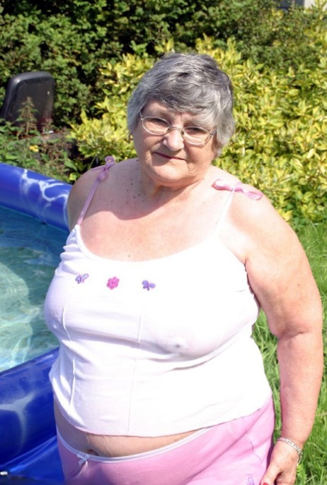 Overweight UK nan Grandma Libby exposes her boobs in a backyard swimming pool 60004597