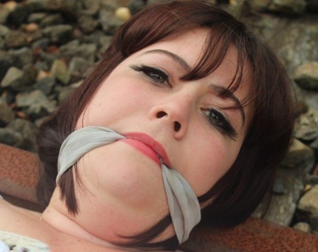 Brunette BBW is left tied up and gagged in a slip on railway tracks 38322890