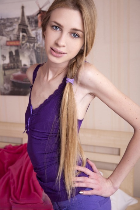 Slim teen Ivanka showcases her shaved pussy in socks and a long ponytail 97929119