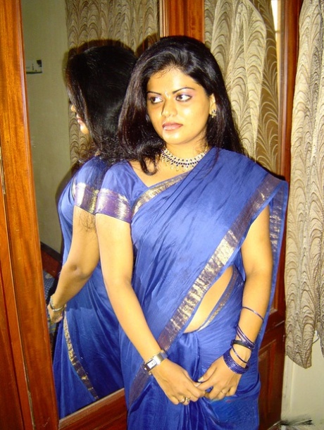 Pretty Indian girl sets her natural tits free of traditional clothing 18740371
