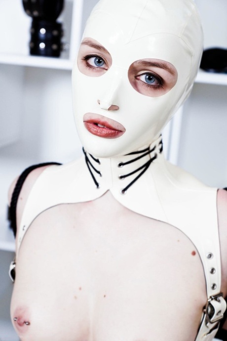 Fetish model Dutch Dame poses in revealing latex attire and platform boots 32544213