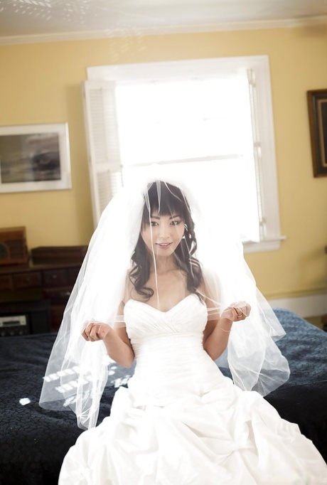 Sexy Asian bride Marica Hase removing wedding dress for nude photo spread 48358893