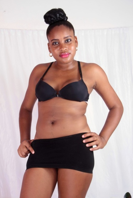 Black amateur Amber sheds bra and miniskirt to display her wide open beaver 45968827